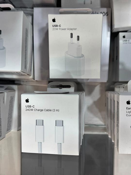 Genuine Apple accessories: 20 W USB-C power adapters and a 240 W USB-C charge cable