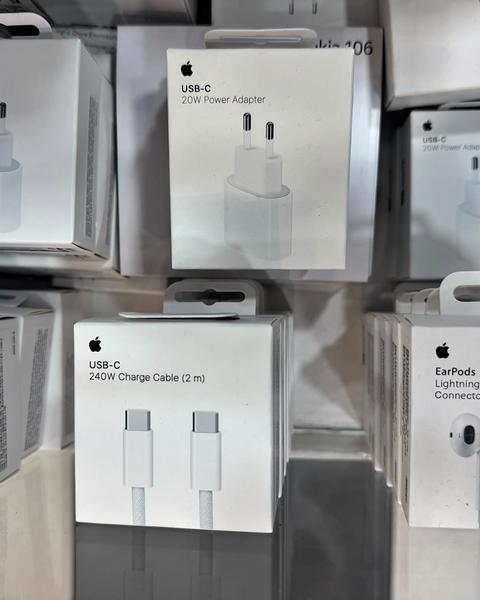 Genuine Apple accessories: 20 W USB-C power adapters and a 240 W USB-C charge cable